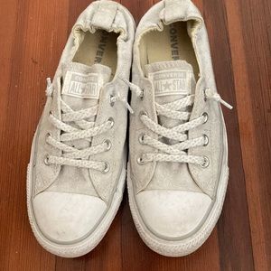 Women’s white slip on Converse.